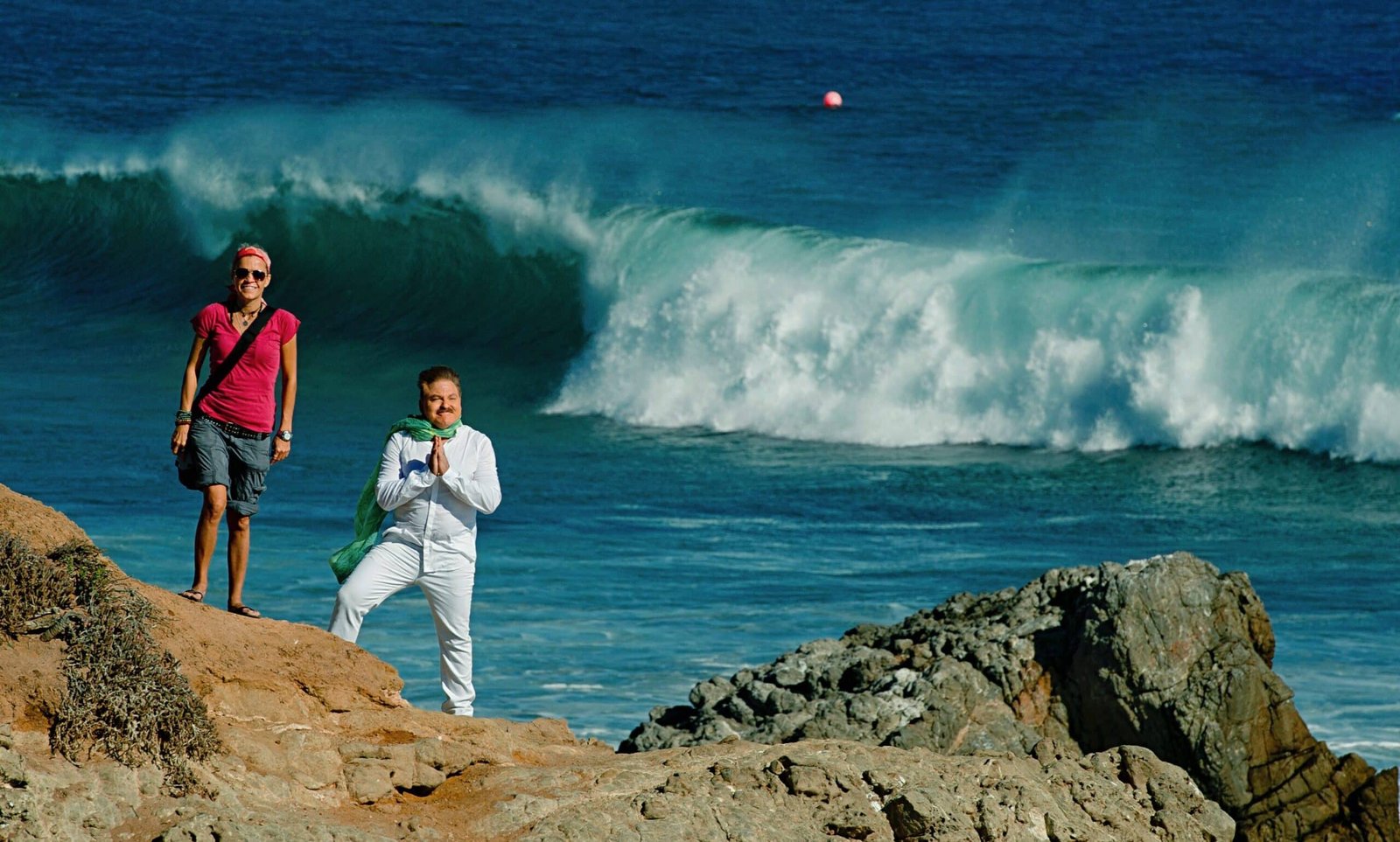 Kelley Kreinbrink with James Van Praagh on the rocks in Malibu, CA